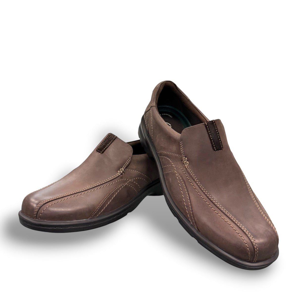 Clarks Gessler Step dark brown nubuck leather slip-on casual shoe with a lightweight EVA sole. photo of the front.
