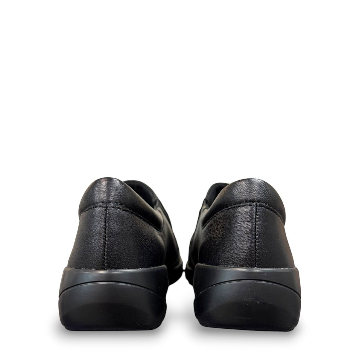 Sina Footwear Clarks Kaetlyn Mila black leather slip-on shoe with side zip and comfortable foam footbed .
photo of the back.