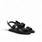 Clarks Karsea Strap black leather sandals with adjustable ankle strap and comfortable flat sole. front view.