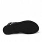 Clarks Karsea Strap black leather sandals with adjustable ankle strap and comfortable flat sole. bottom view.
