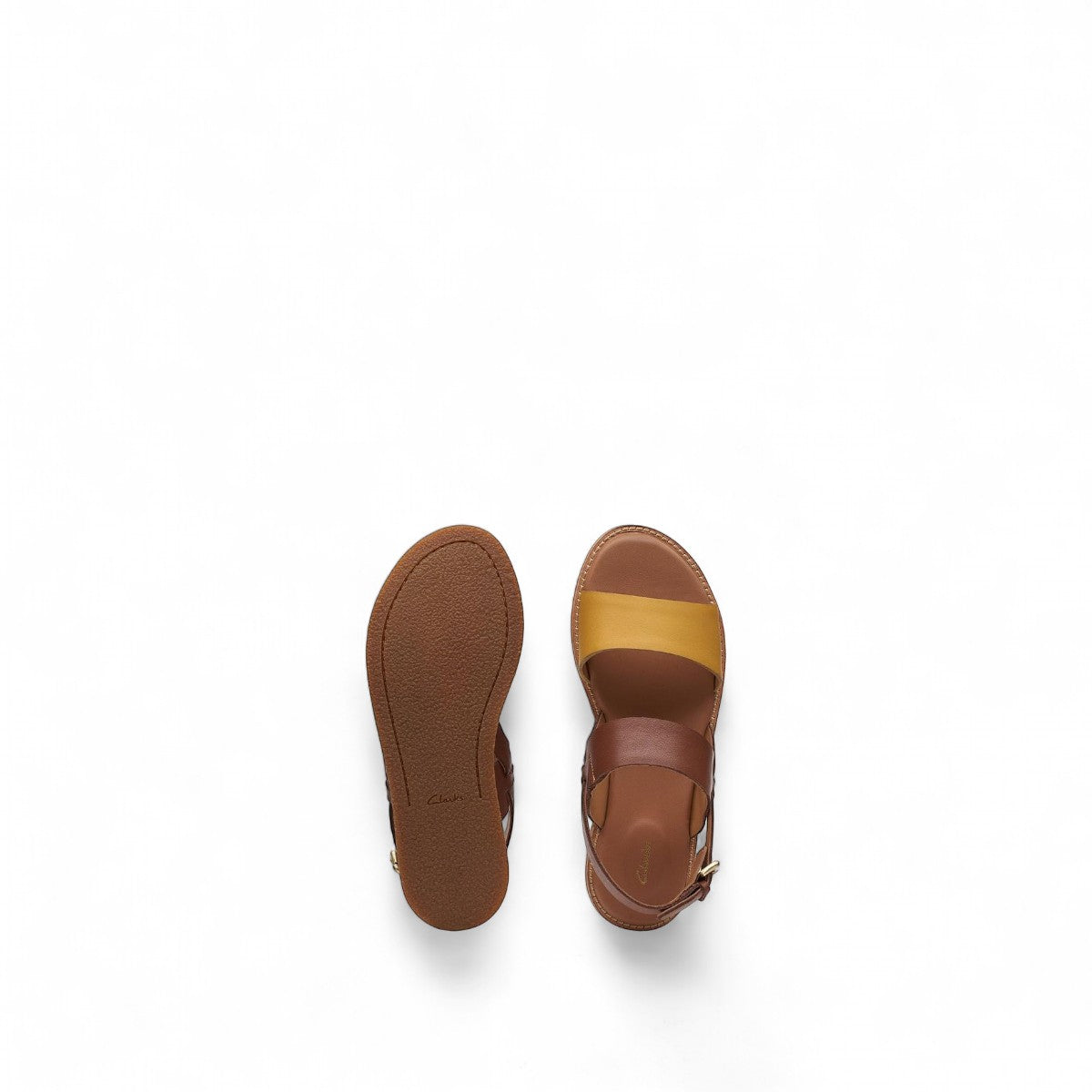 Clarks Karsea Strap tan and yellow leather sandals with adjustable buckle and cushioned footbed. top view.
