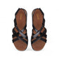 Clarks Kitly Go black leather strappy sandals with adjustable straps and a cushioned footbed. top view.