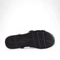 Clarks Kitly Go black leather strappy sandals with adjustable straps and a cushioned footbed. bottom view.