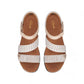 Clarks Kitly Way white leather sandal with laser-cut details, adjustable straps, and cushioned footbed. top view.