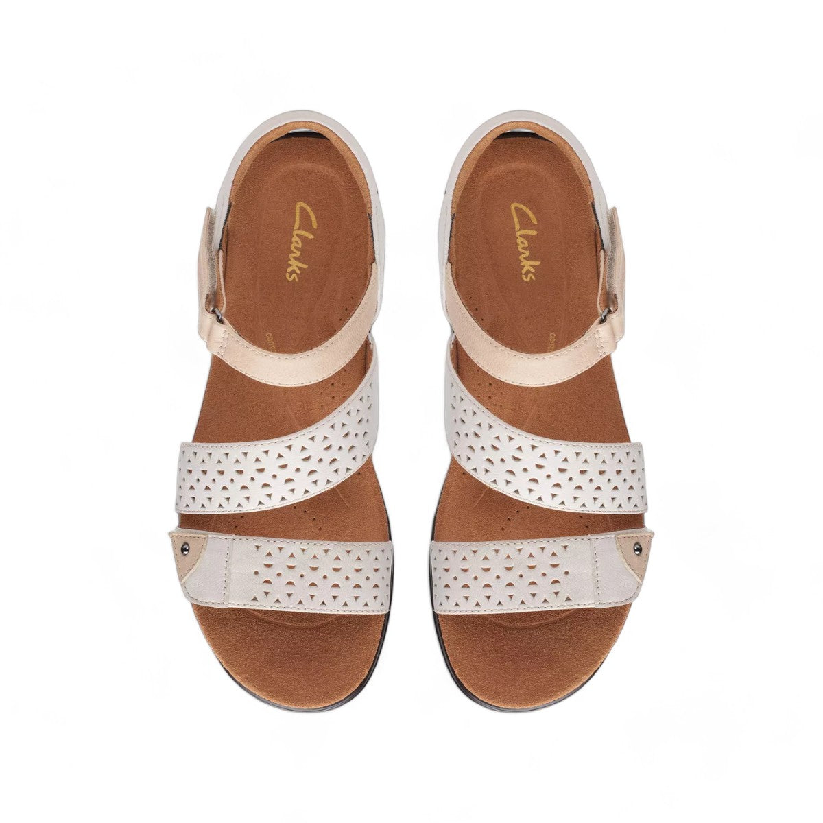 Clarks Kitly Way white leather sandal with laser-cut details, adjustable straps, and cushioned footbed. top view.