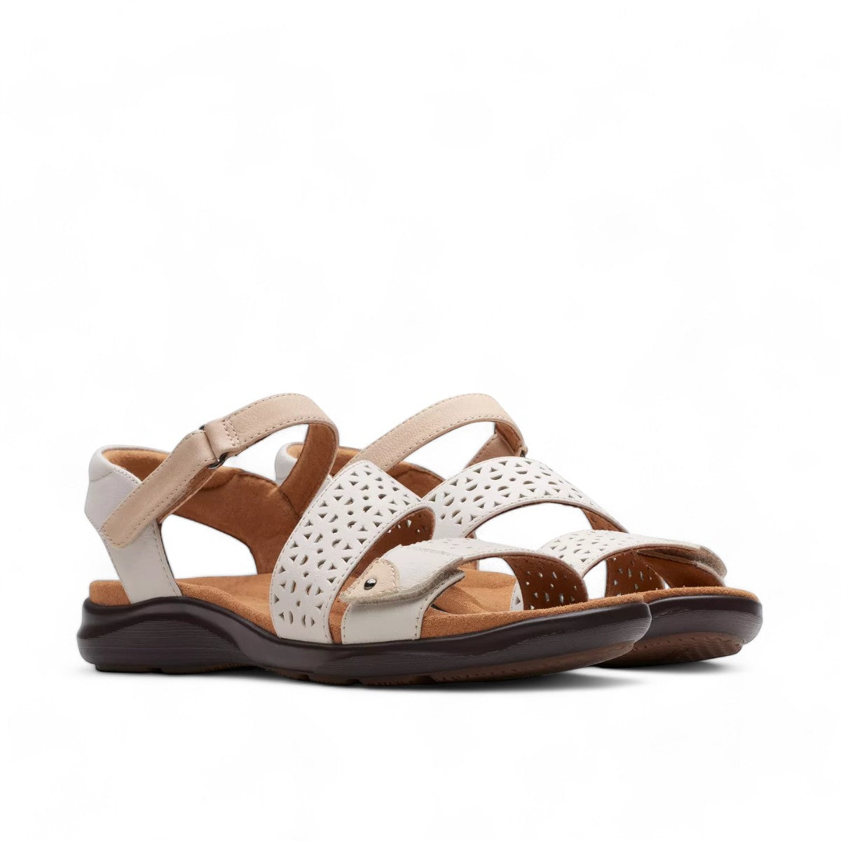 Clarks Kitly Way white leather sandal with laser-cut details, adjustable straps, and cushioned footbed. front view.