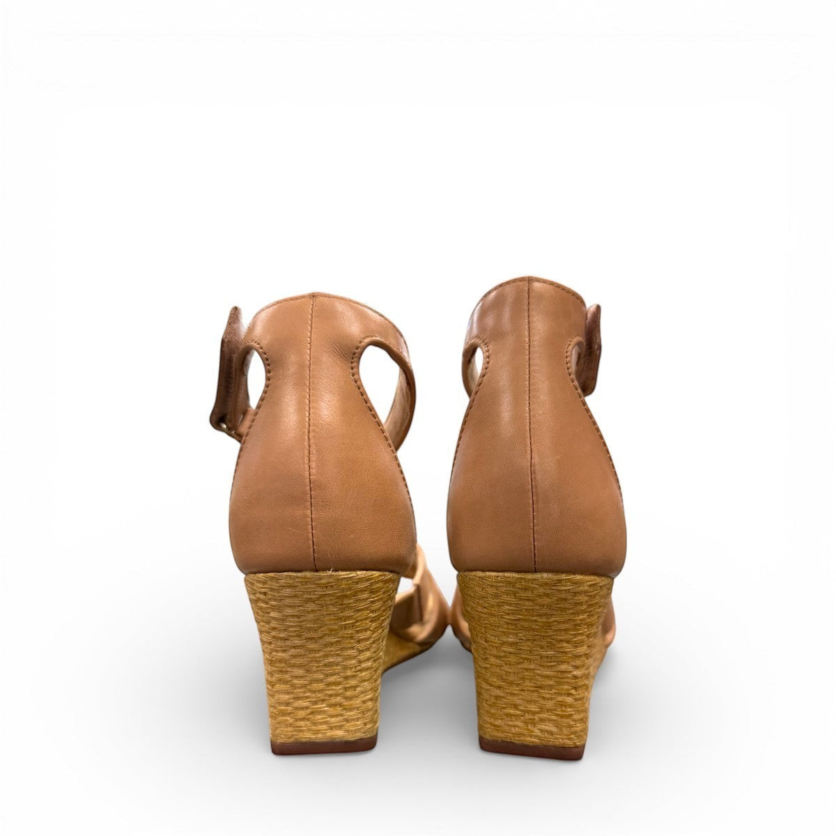 Clarks Kyarra Joy warm beige leather wedge sandal with ankle strap and woven jute heel. back view.