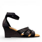 Clarks Kyarra Joy black leather wedge sandals with ankle strap and textured heel. right view.