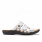 Clarks Laurieann Echo white leather sandals with adjustable velcro straps and cushioned EVA outsole. right view.