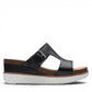 Clarks Lizby Ease black leather slide sandals with adjustable buckle and cork-effect wedge platform sole. right view.
