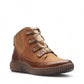 Clarks Magnolia Moon dark tan leather ankle boot with side zip, stitch detailing, and textured sole. front view.