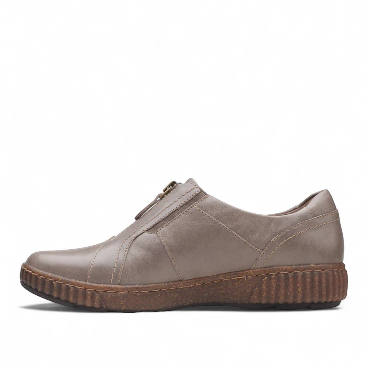 Clarks Magnolia Zip slip-on shoe in dark taupe leather with front zipper and textured cork-flecked sole. left view.