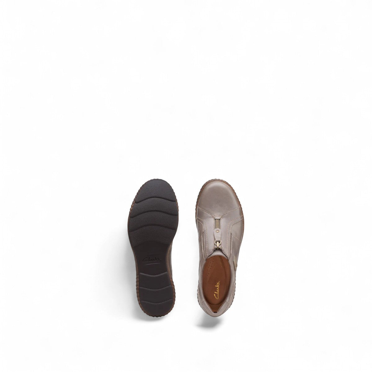 Clarks Magnolia Zip slip-on shoe in dark taupe leather with front zipper and textured cork-flecked sole. top view.