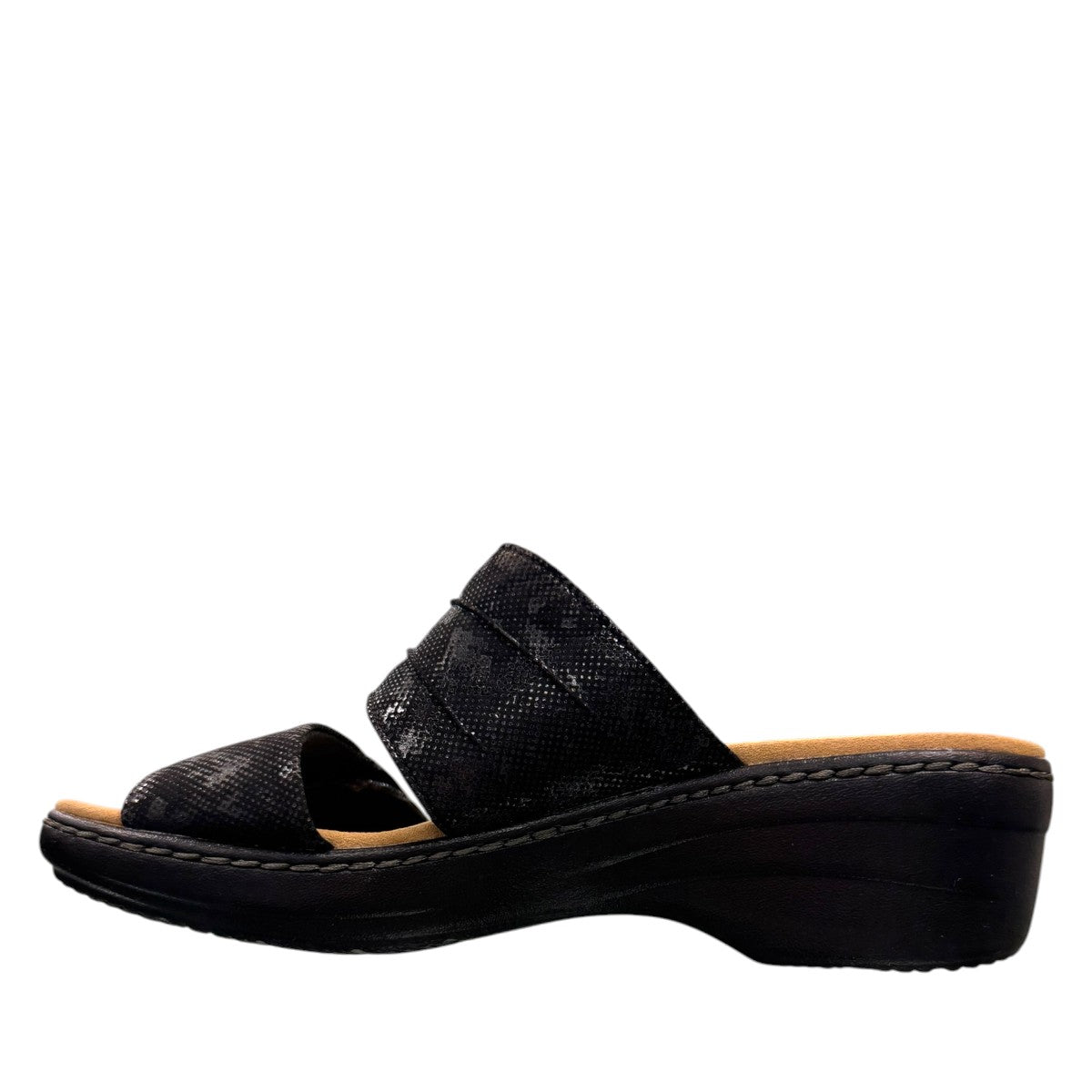 Clarks Merliah Charm black slide sandal with textile upper, and cushioned EVA sole. left view.