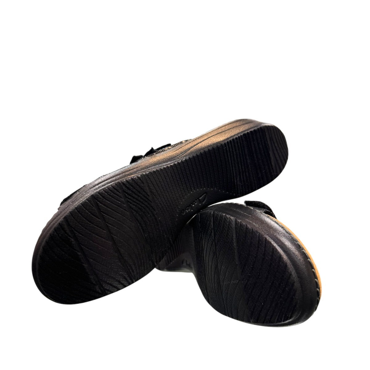 Clarks Merliah Charm black slide sandal with textile upper, and cushioned EVA sole. bottom view.