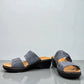 Clarks Merliah Charm blue grey slide sandal with adjustable straps, and cushioned sole. front view.