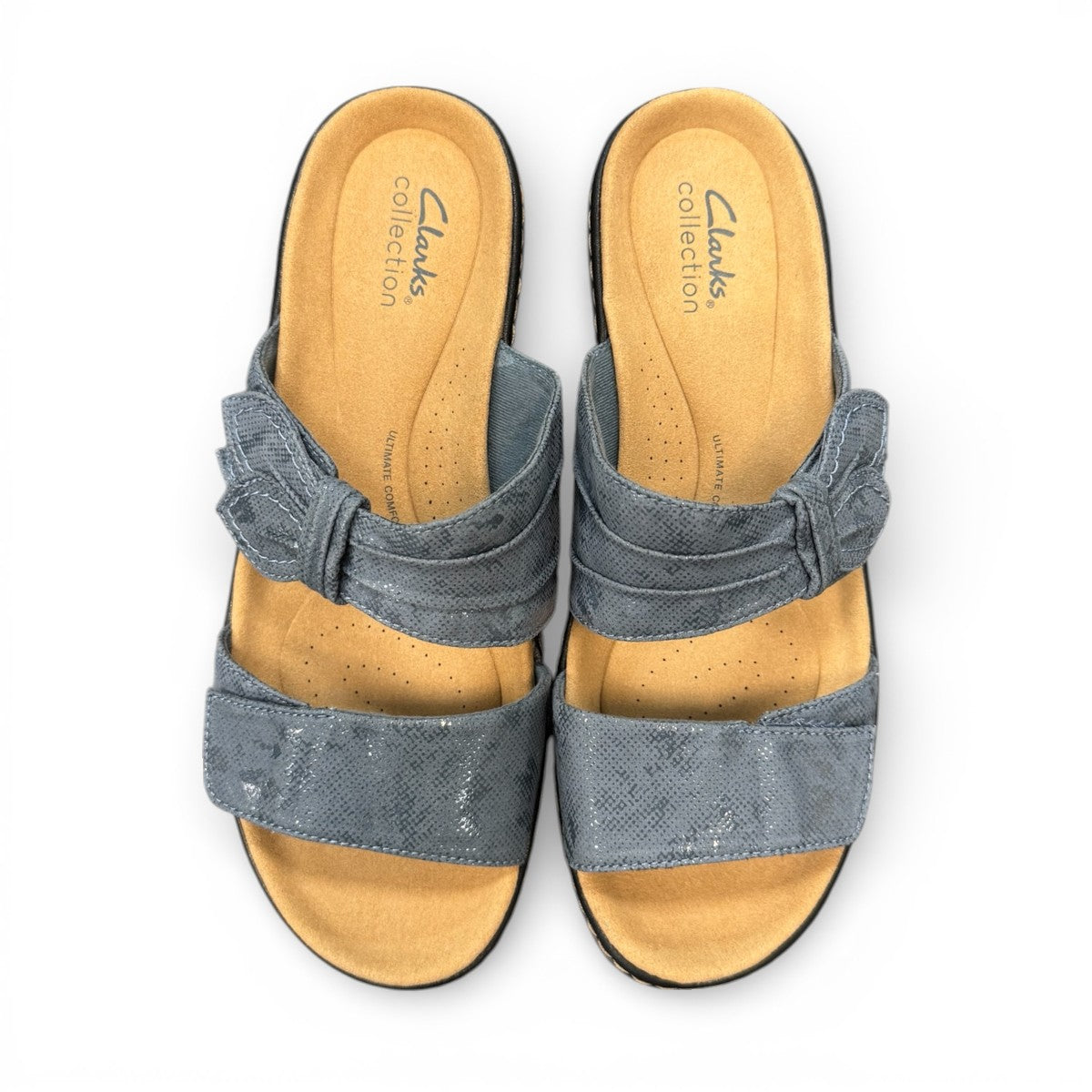 Clarks Merliah Charm blue grey slide sandal with adjustable straps, and cushioned sole. top view.