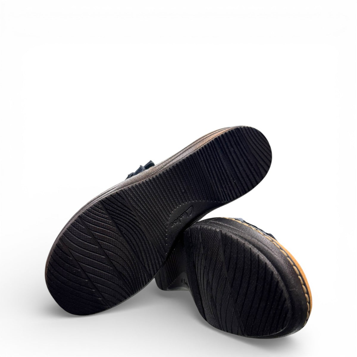 Clarks Merliah Charm blue grey slide sandal with adjustable straps, and cushioned sole. bottom view.
