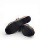 Clarks Merliah Charm taupe metallic slide sandal with adjustable grip tape closure.  bottom view.