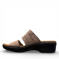 Clarks Merliah Charm taupe metallic slide sandal with adjustable grip tape closure. left view.