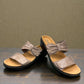 Clarks Merliah Charm taupe metallic slide sandal with adjustable grip tape closure. front view.