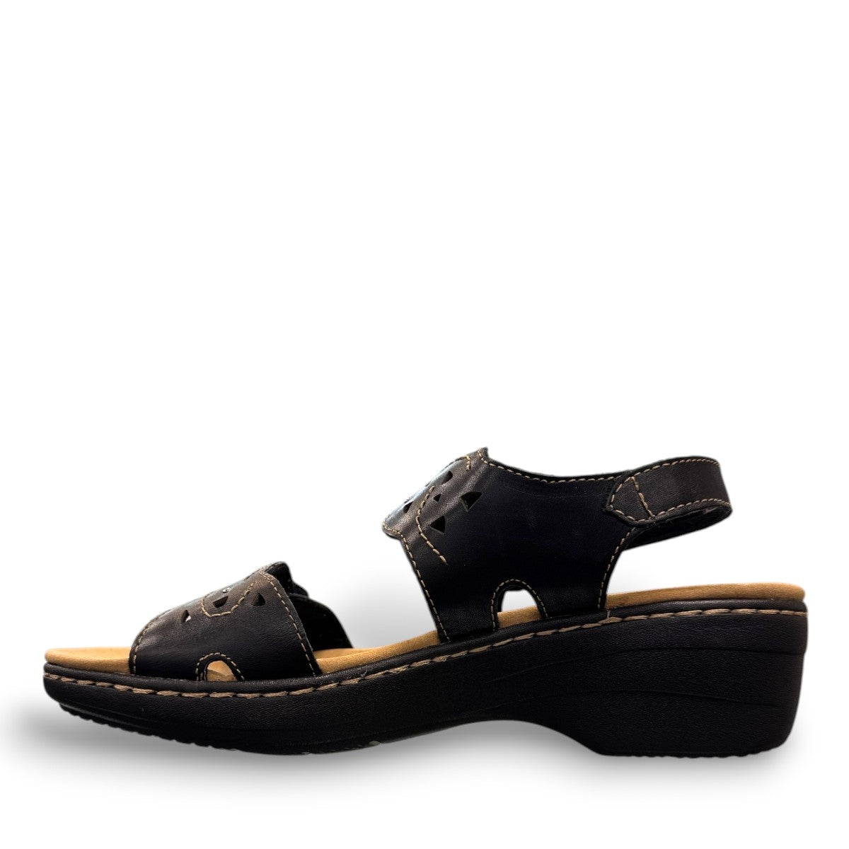 Clarks Merliah Dove black leather wedge sandals with adjustable straps and perforated detailing. left view.