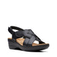 Clarks Merliah Echo black leather wedge sandals with riptape closure and cushioned footbed. front view.