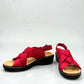 Clarks Merliah Echo red suede wedge sandals with riptape closure and cushioned footbed.front view.