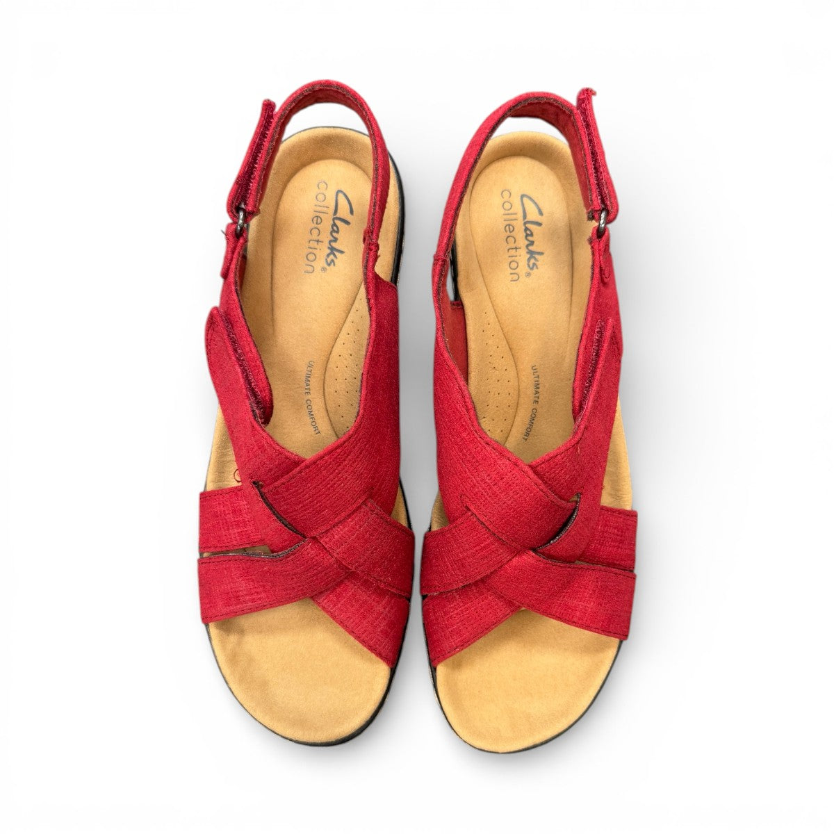 Clarks Merliah Echo red suede wedge sandals with riptape closure and cushioned footbed. top view.