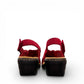 Clarks Merliah Echo red suede wedge sandals with riptape closure and cushioned footbed. back view.