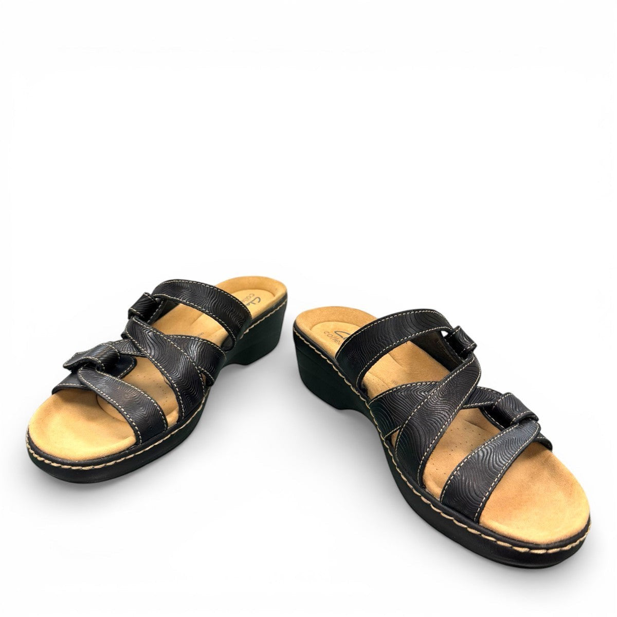Clarks Merliah Karli black leather sandal with mid-height heel, riptape closure, and comfort footbed. front view.