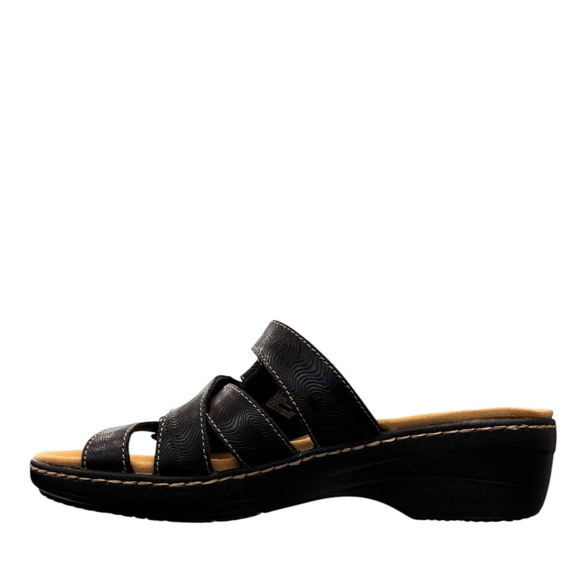 Clarks Merliah Karli black leather sandal with mid-height heel, riptape closure, and comfort footbed. left view.