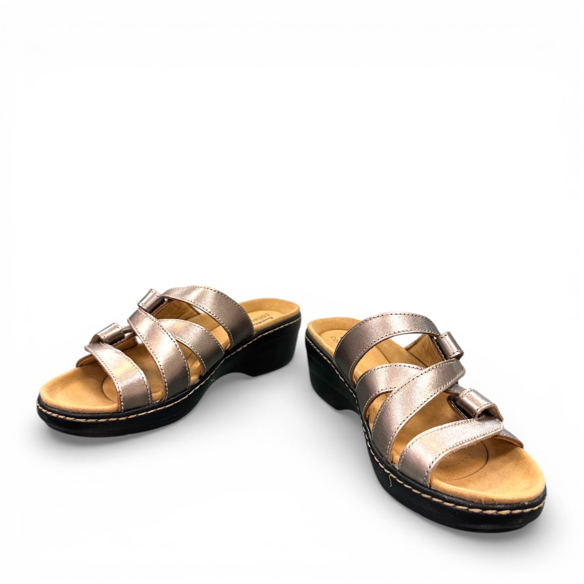 Clarks Merliah Karli metallic leather sandal with adjustable riptape straps and a mid-height heel.
front view.