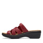 Clarks Merliah Karli red leather sandal with adjustable riptape straps and a comfortable mid-height heel. left view.