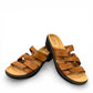 Clarks Merliah Karli tan leather sandals with adjustable riptape straps and a comfortable mid-height heel. front view.