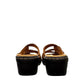 Clarks Merliah Karli tan leather sandal with a mid-height heel, riptape straps, and comfort footbed.
back view.