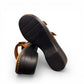 Clarks Merliah Karli tan leather sandal with a mid-height heel, riptape straps, and comfort footbed.
bottom view.