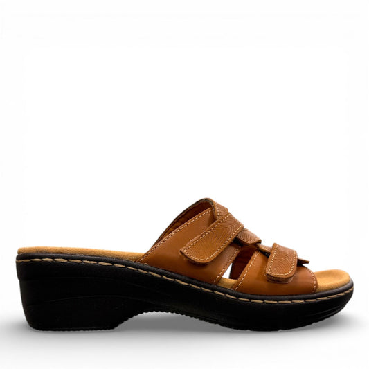 Clarks Merliah Karli tan leather sandal with a mid-height heel, riptape straps, and comfort footbed.
right view.