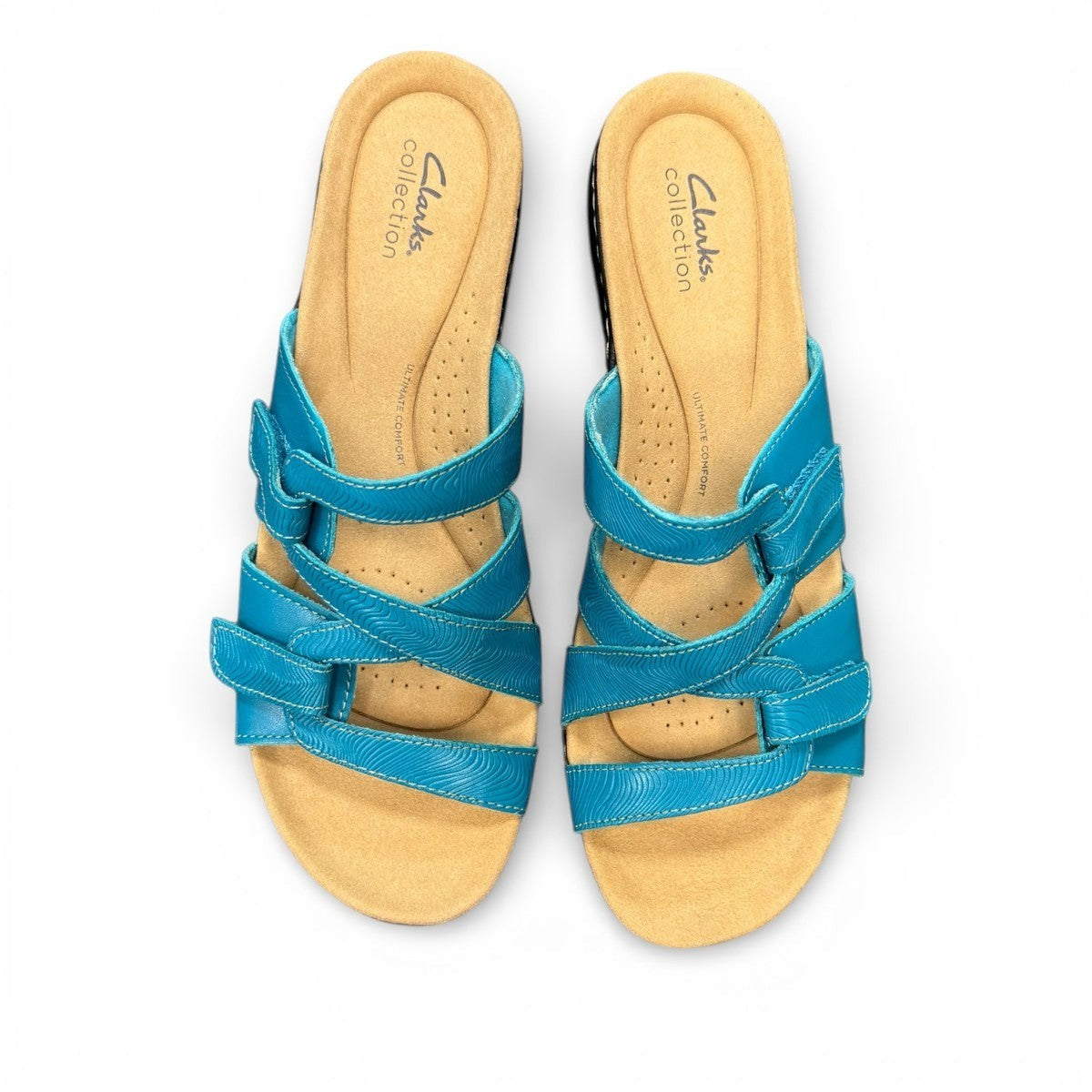 Clarks Merliah Karli turquoise leather sandal with adjustable riptape straps and comfortable footbed. top view.