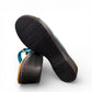 Clarks Merliah Karli turquoise leather sandal with adjustable riptape straps and comfortable footbed. bottom view.