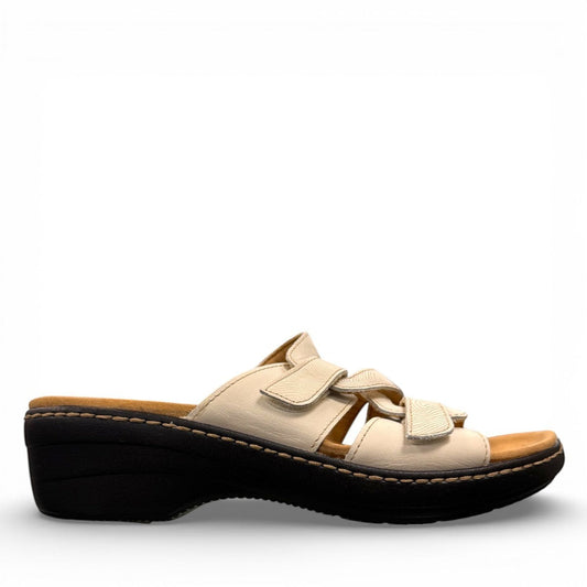 Clarks Merliah Karli white leather sandal with adjustable riptape straps and a comfortable mid-height heel. right view.