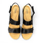 Clarks Merliah Opal black leather wedge sandals with adjustable straps and perforated detailing. top view.