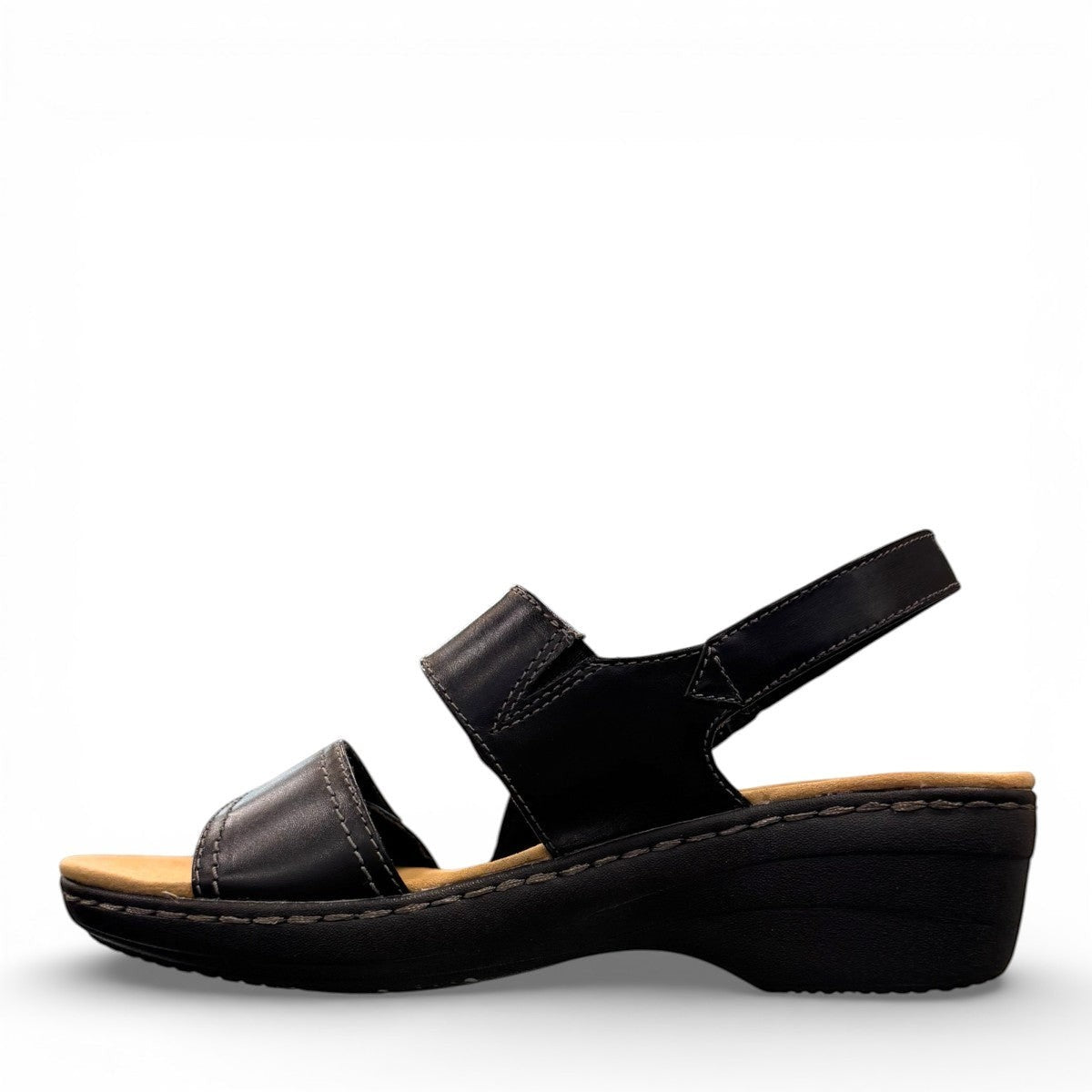 Clarks Merliah Opal black leather wedge sandals with adjustable straps and perforated detailing. left view.
