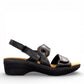 Clarks Merliah Opal black leather wedge sandals with adjustable straps and perforated detailing.
right view.