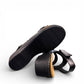Clarks Merliah Opal black leather wedge sandals with adjustable straps and perforated detailing. bottom view.