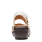 Clarks Merliah Opal white leather wedge sandals with adjustable straps and cushioned insole. back view.