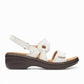 Clarks Merliah Opal white leather wedge sandals with adjustable straps and cushioned insole. right view.