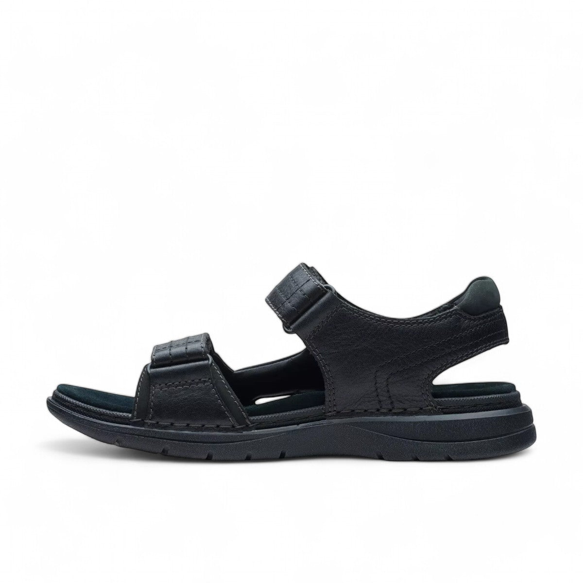 Clarks Nature Trek black nubuck leather sandal with adjustable hook and loop straps and rubber sole.
Photo of the left side.