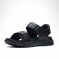 Clarks Nature Trek black nubuck leather sandal with adjustable hook and loop straps and rubber sole.
Photo of the front.