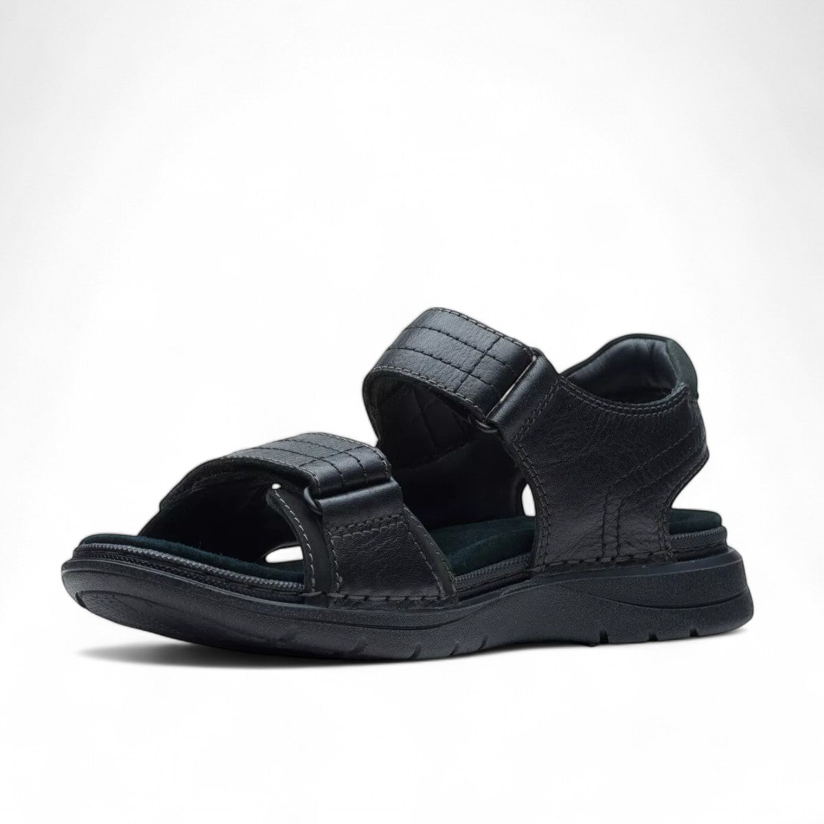 Clarks Nature Trek black nubuck leather sandal with adjustable hook and loop straps and rubber sole.
Photo of the front.